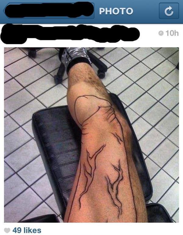 Foto Divertente: Tatuaggio orribile sul braccio..che scandalo!