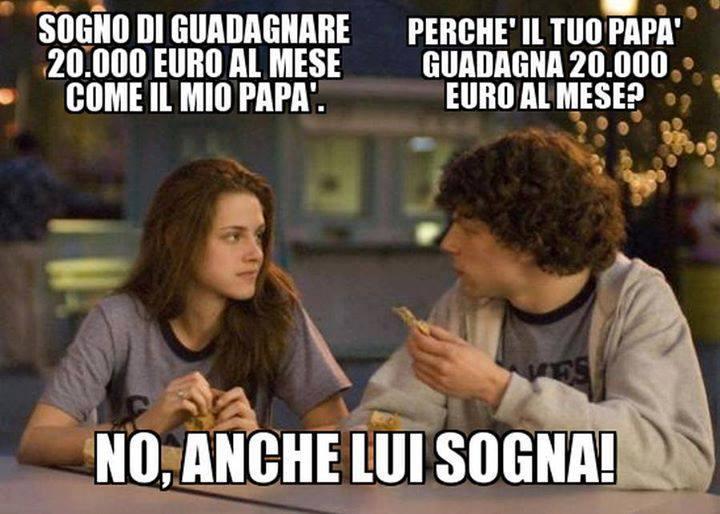 Ragazzo e ragazza che parlano seduti ad un tavolo