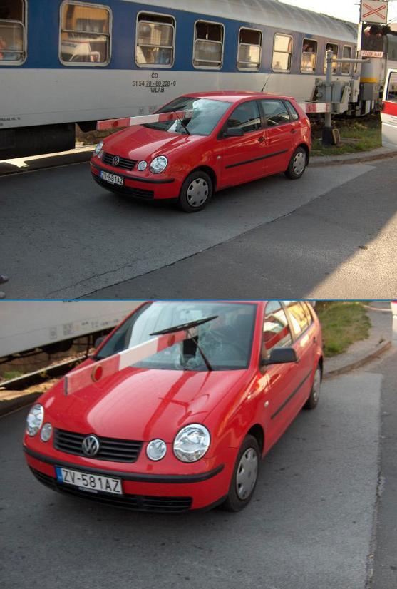 Macchina con sbarra del passaggio a livello nel lunotto