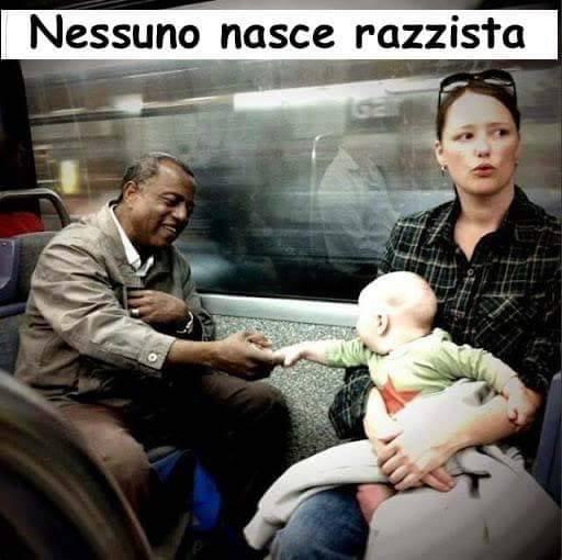 Uomo nero che stringe la mano ad un bambino!