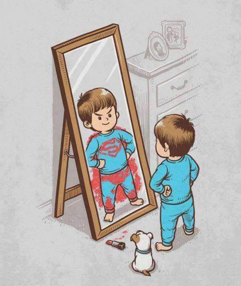 Foto Divertente: Bambino in pigiama si guarda allo specchio e si vede superman