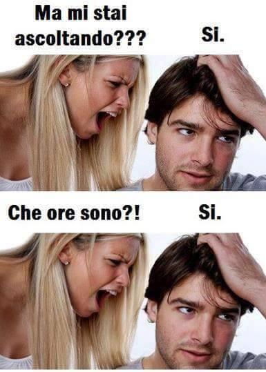 Foto Divertente: Donna che urla ad uomo se la sta ascoltando