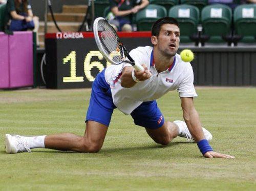Foto Divertente: Riprendere una pallina da tennis